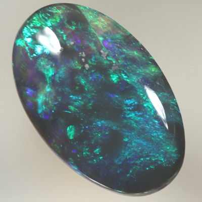 SOLID BLACK OPAL Bright green and turquoise colours SEE VIDEO